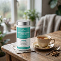 Ashwagandha pot on a wooden table with a cup of herbal tea