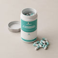 D-Mannose & Cranberry capsules beside the open pot