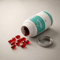 Krill Oil red softgel capsules beside the open pot