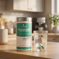 Multivitamin Complete pot on a kitchen counter with a glass of water