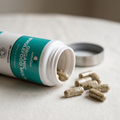Organic Wholefood Kids capsules beside the open pot
