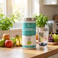 Organic Wholefood Kids pot on a kitchen counter with fresh fruit